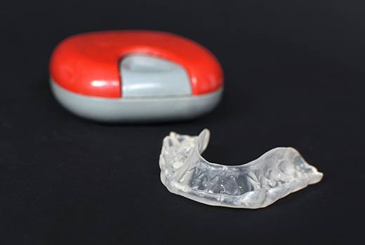 A customized dental mouthguard and protective case