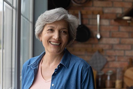 Woman smiling with dentures