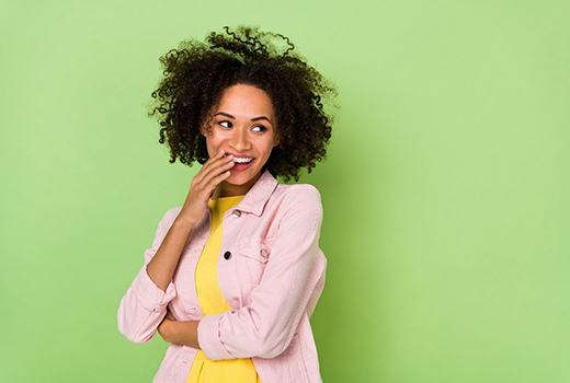 woman smiling about teeth whitening in Lynchburg