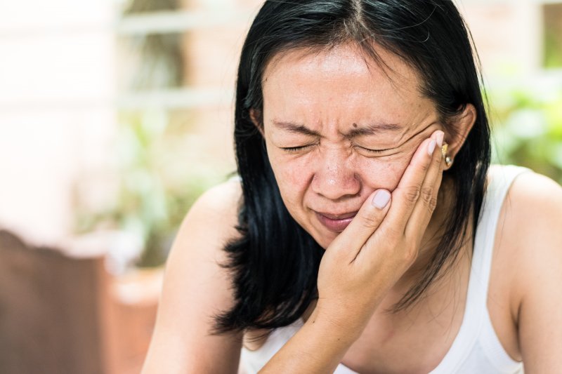 Woman with tooth infection