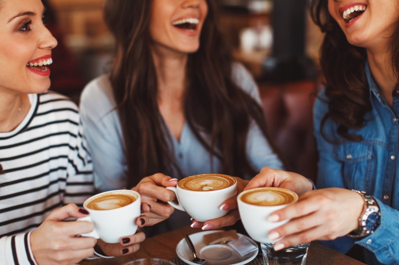 Women with hot drinks