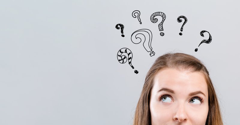 Woman questioning dental myths