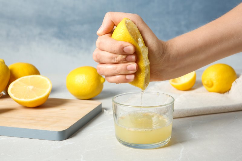 Hand juicing lemons