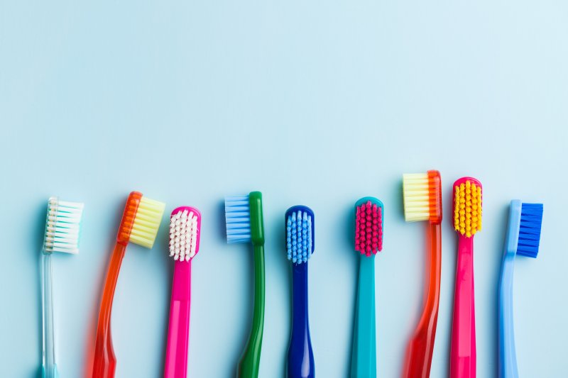 row of colorful toothbrushes